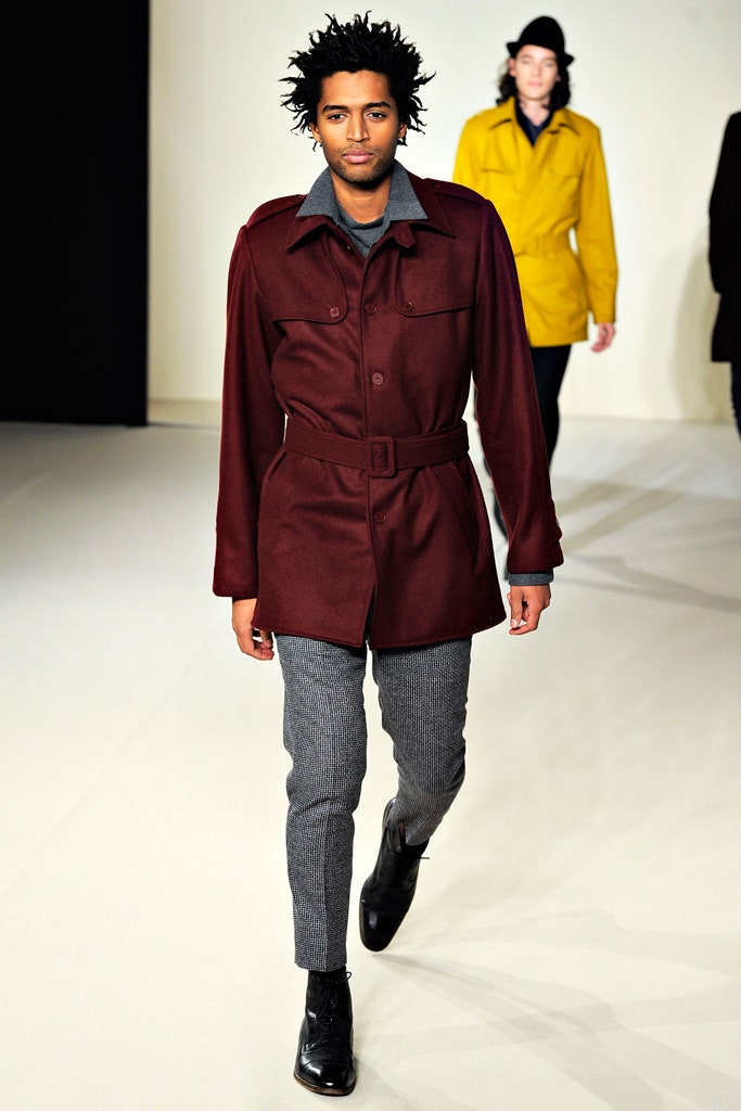 maroon wool coat with gray pants