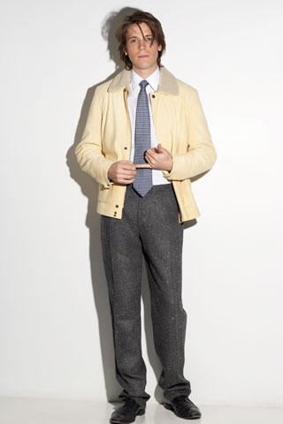 yellow jacket with gray pants