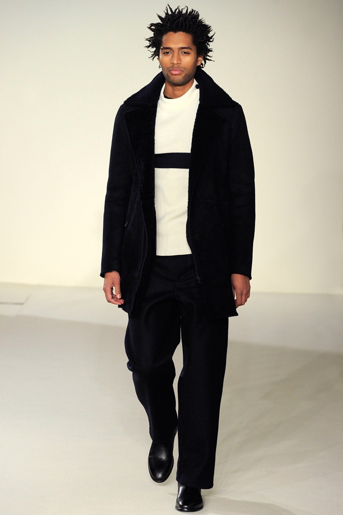 black wool coat white sweater
