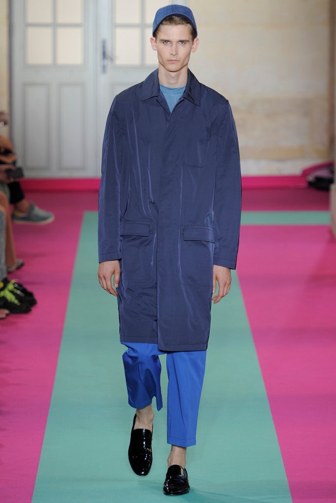 blue vinyl coat with slim pants