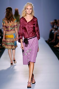 red silk blouse and purple skirt