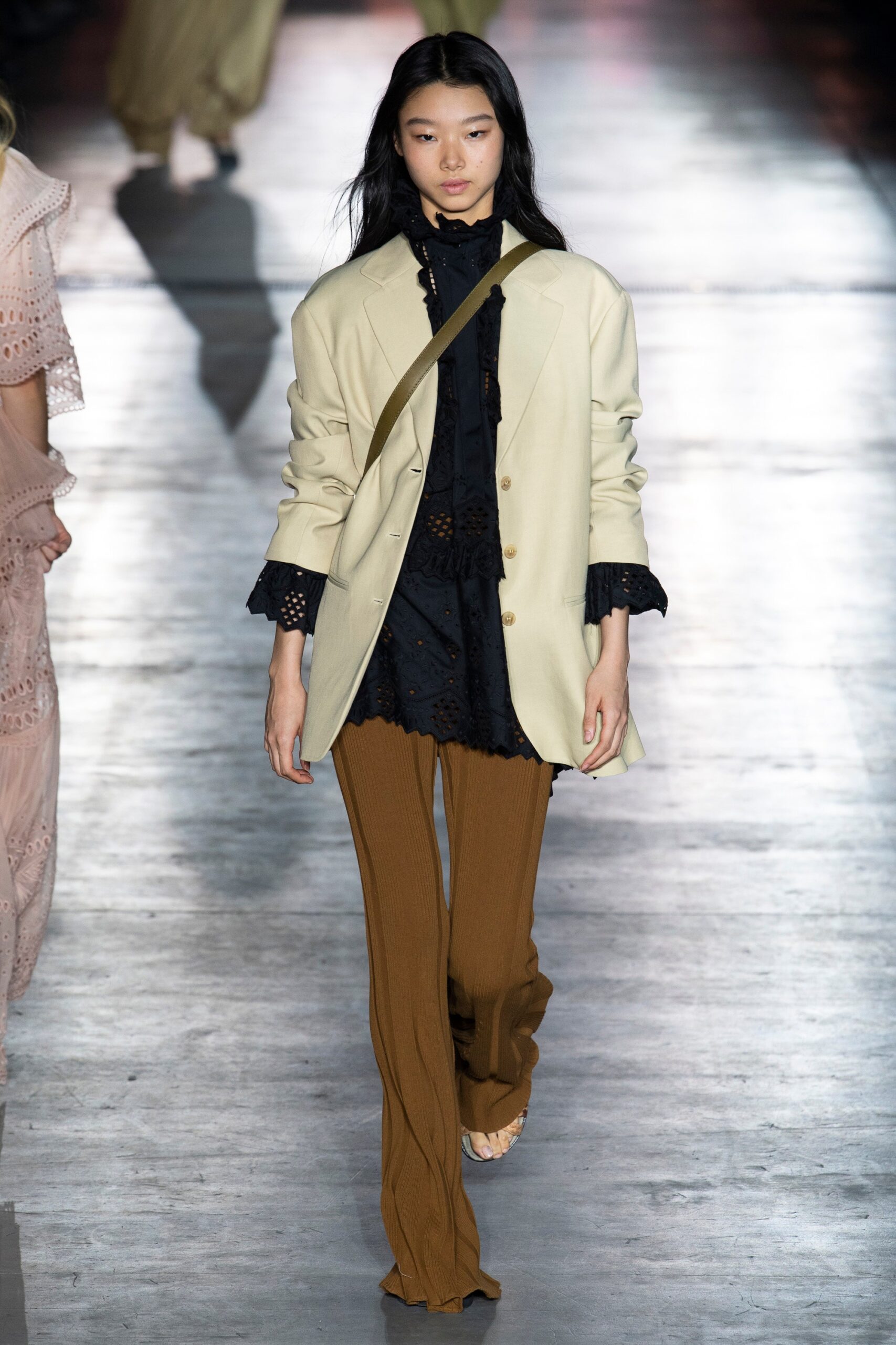 beige blazer black top brown pants
