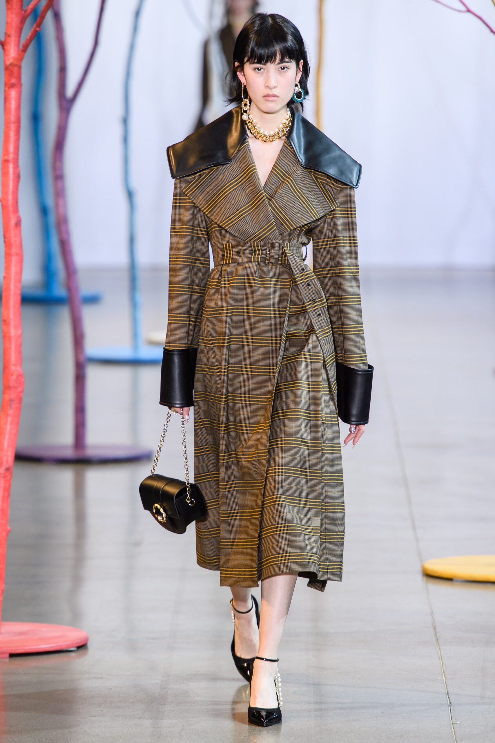 brown and black checked trench coat