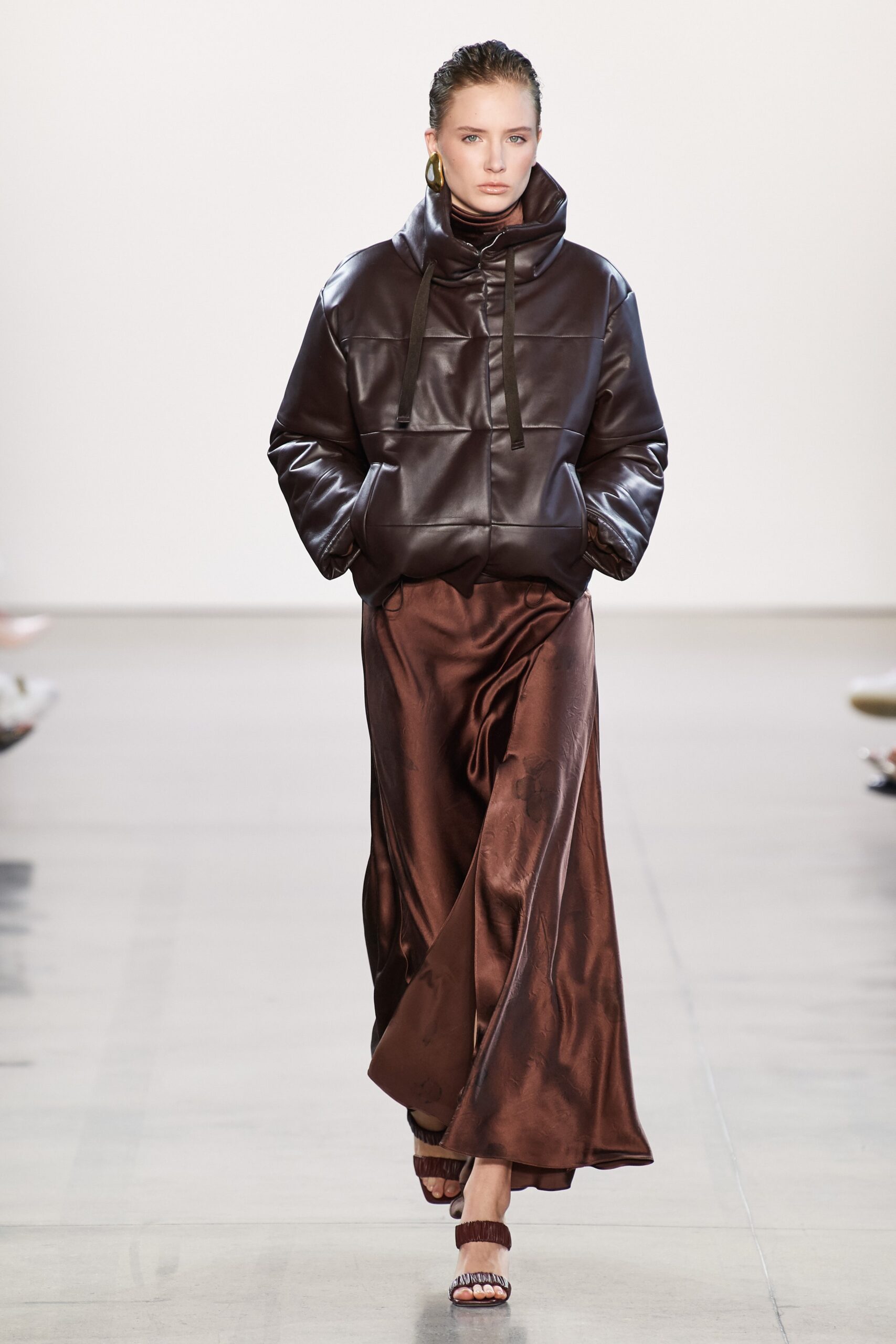 brown silk fitted high-waisted flared flowing skirt
