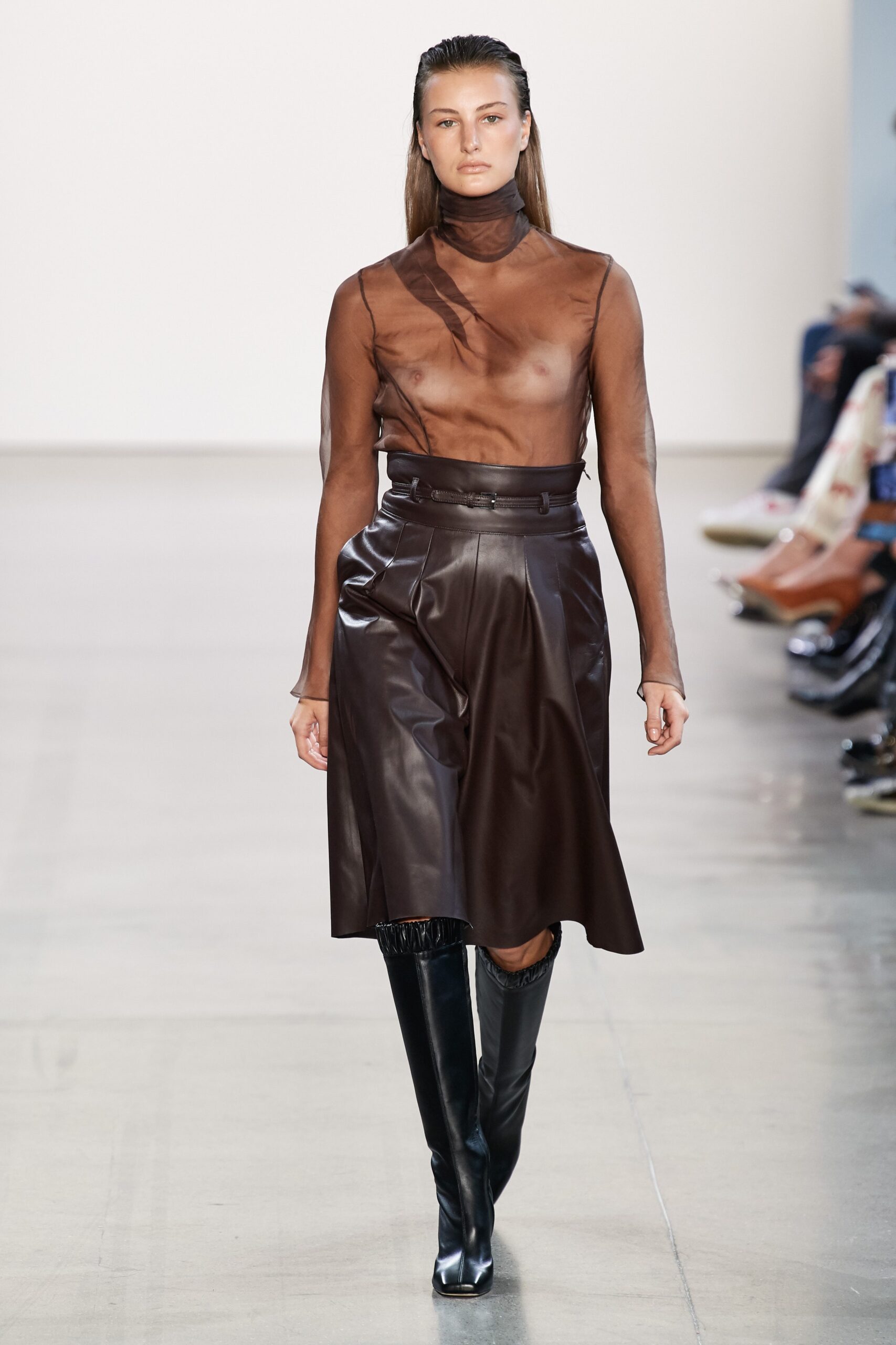 black sheer top brown leather skirt