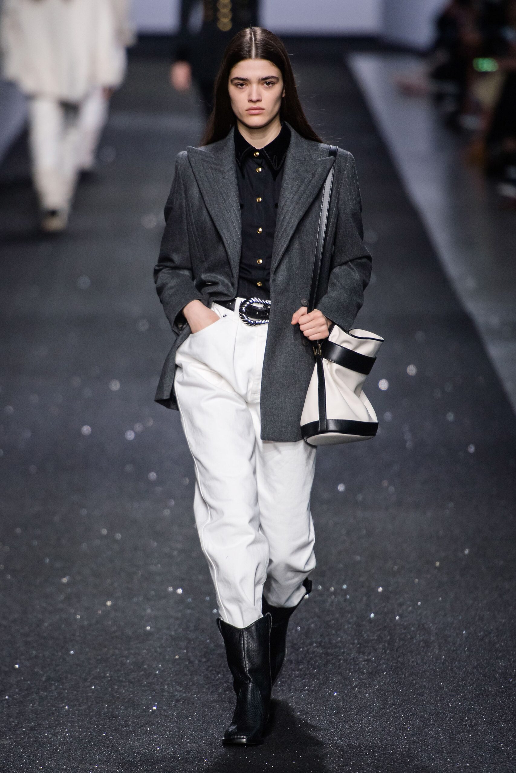 gray tailored blazer with black shirt