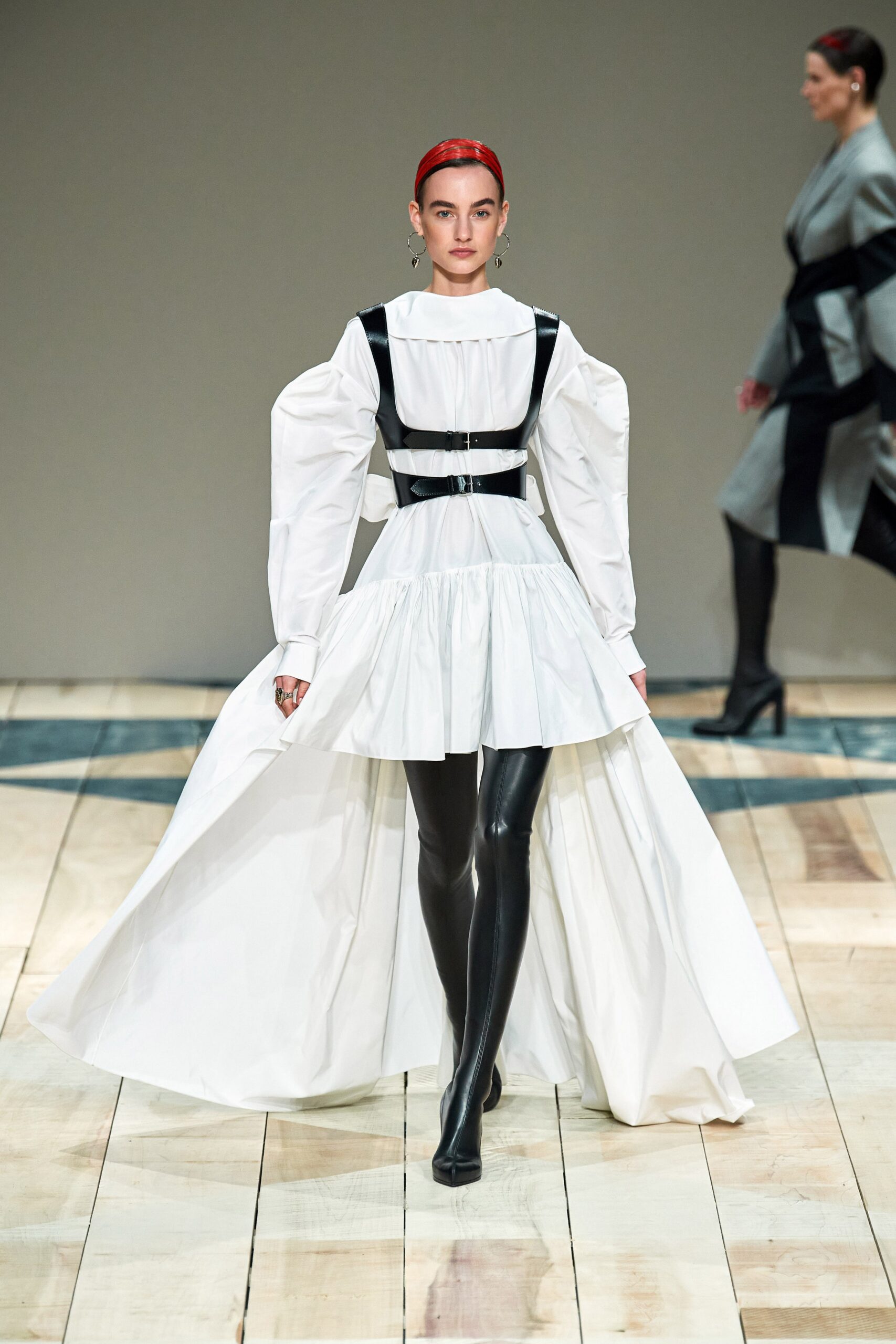 white pleated midi dress and black pants