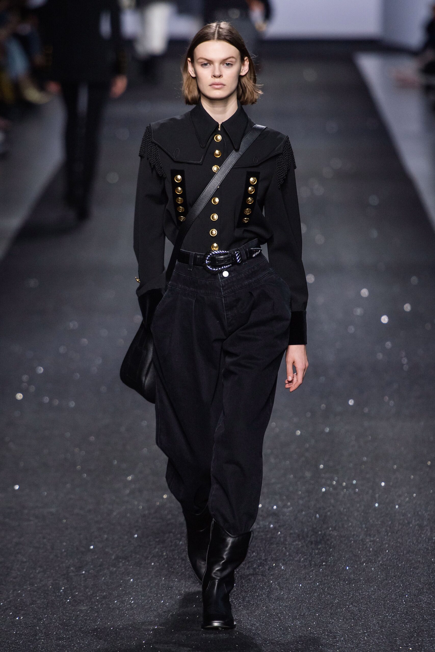 black fitted blouse and relaxed pants