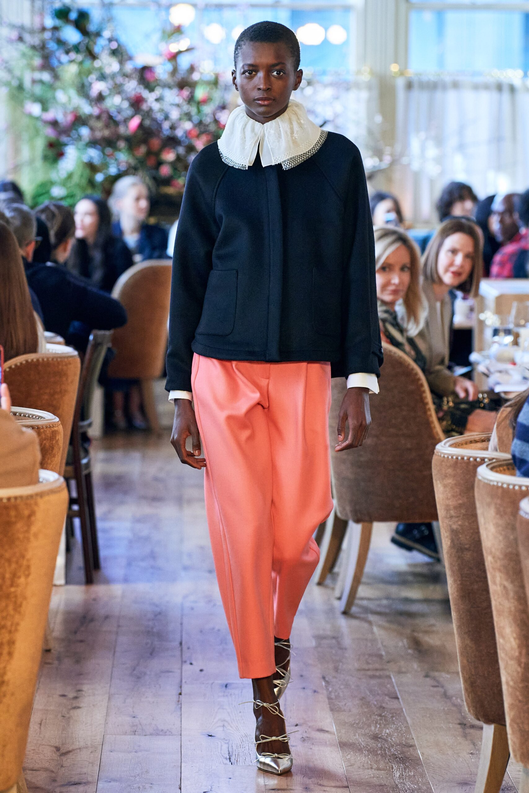 black wool fitted jacket with pink pants