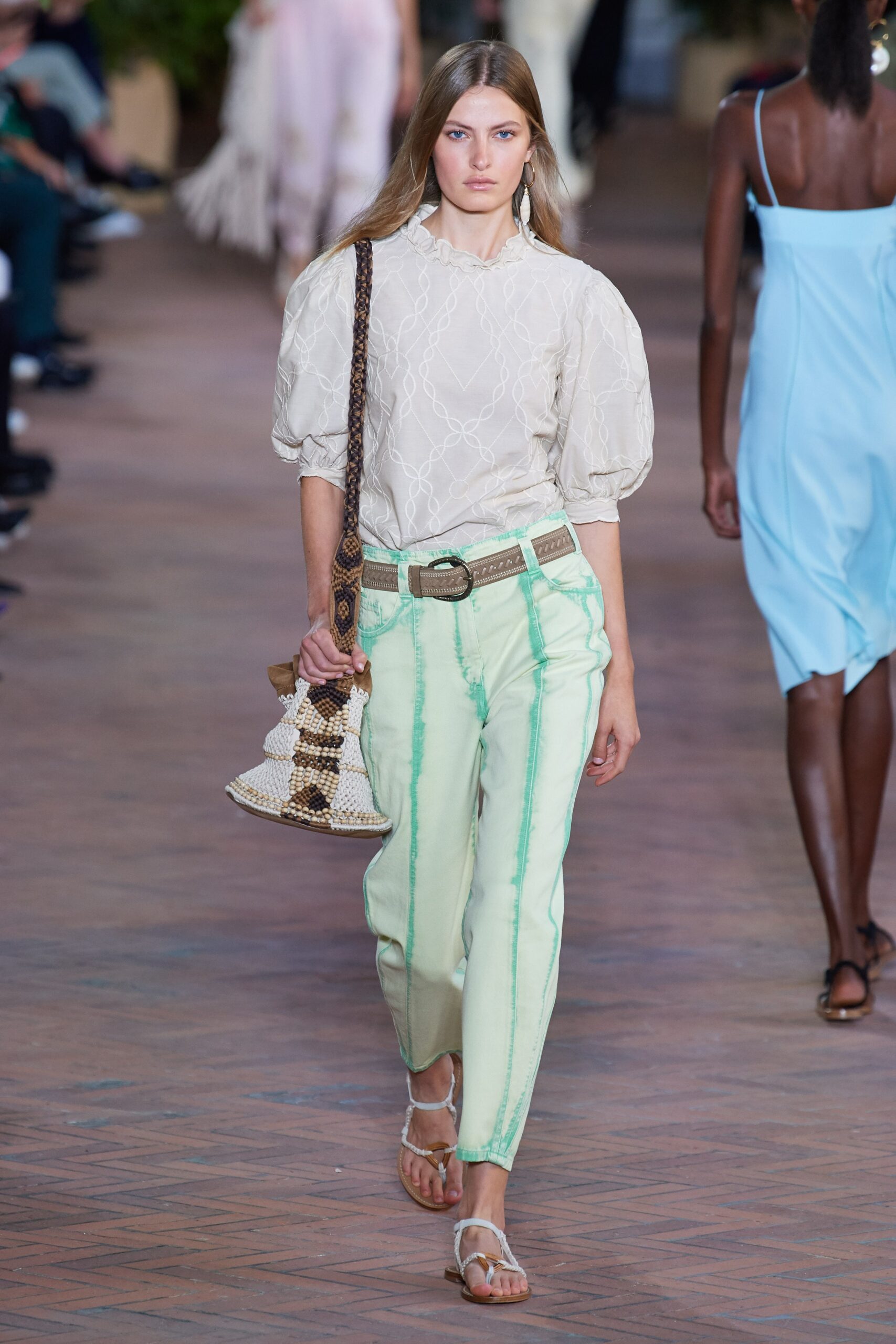 beige relaxed top with mint pants