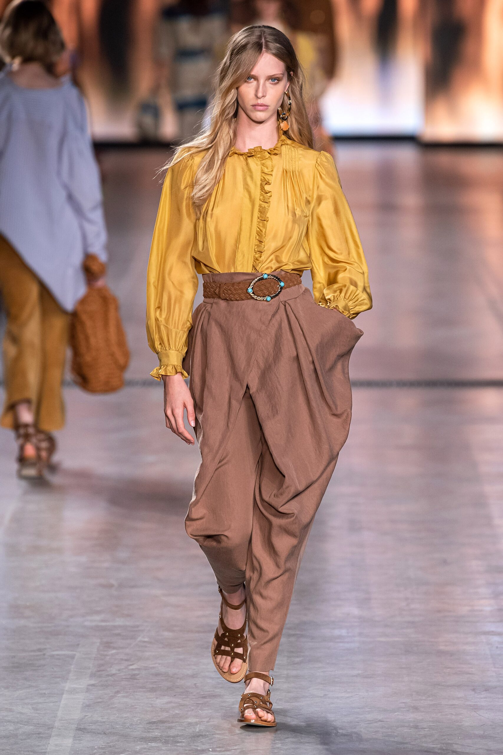 yellow silk blouse with brown pants