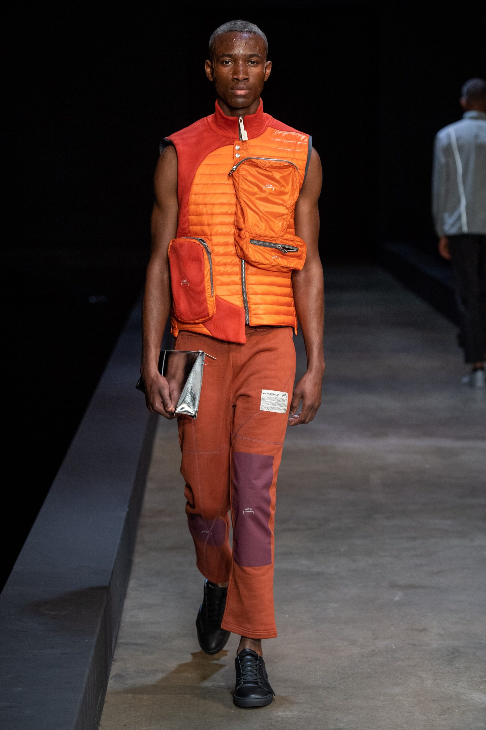orange fitted vest with cargo pants