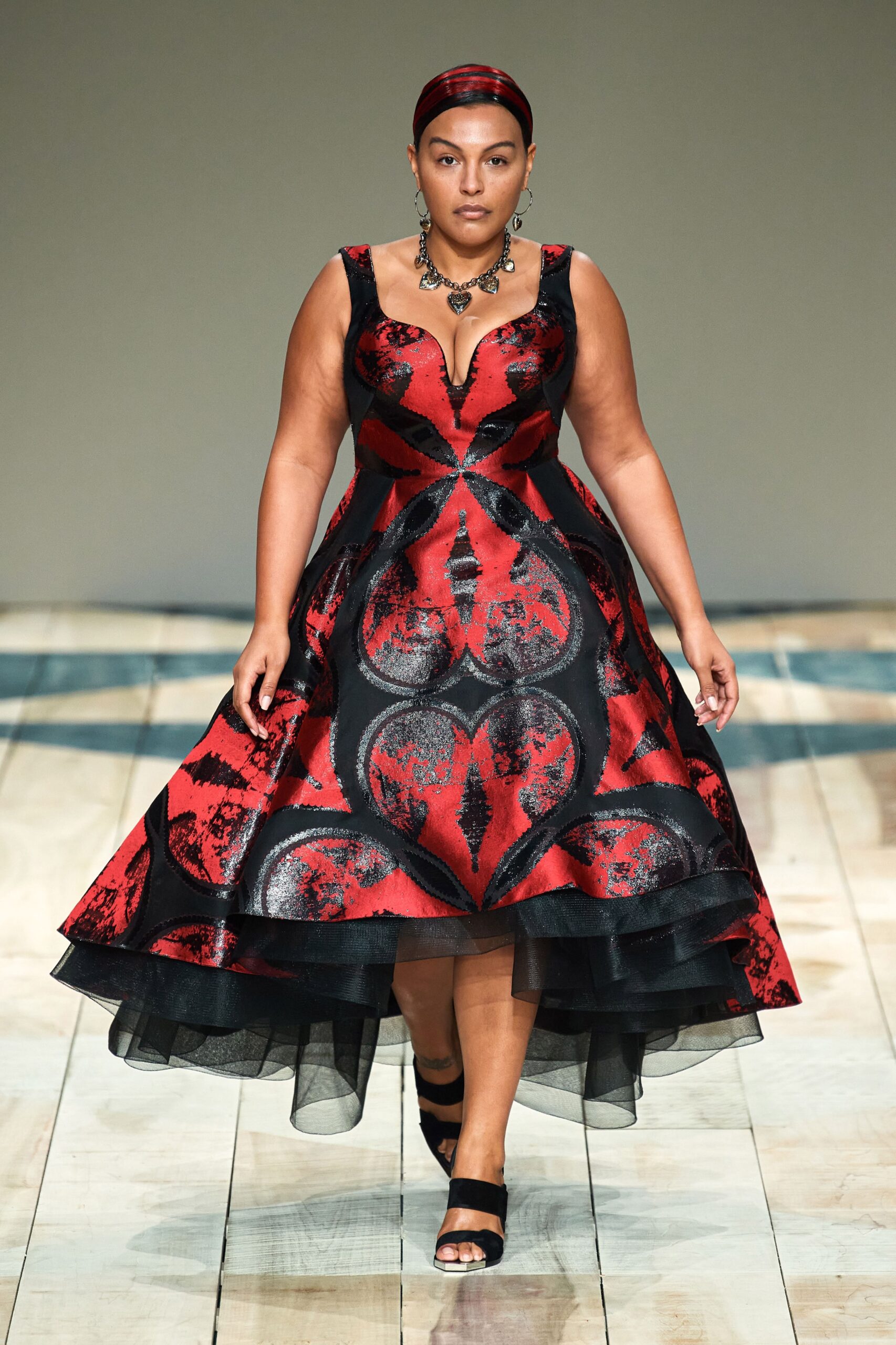 red and black pleated midi dress
