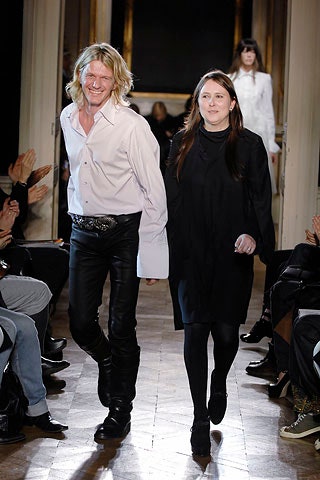 white shirt black leather pants