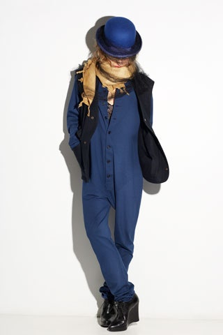 blue relaxed jumpsuit with black vest