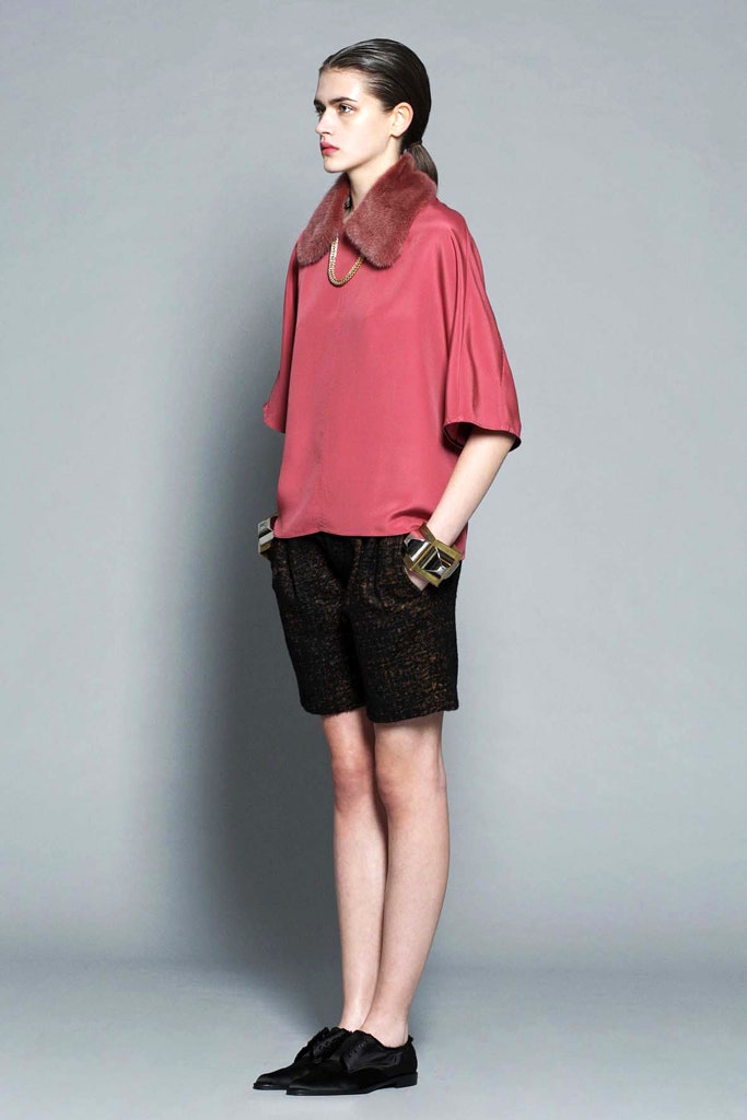 pink silk relaxed top with black shorts