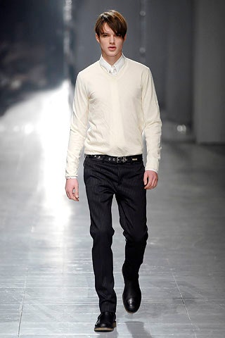 white fitted sweater with black pants