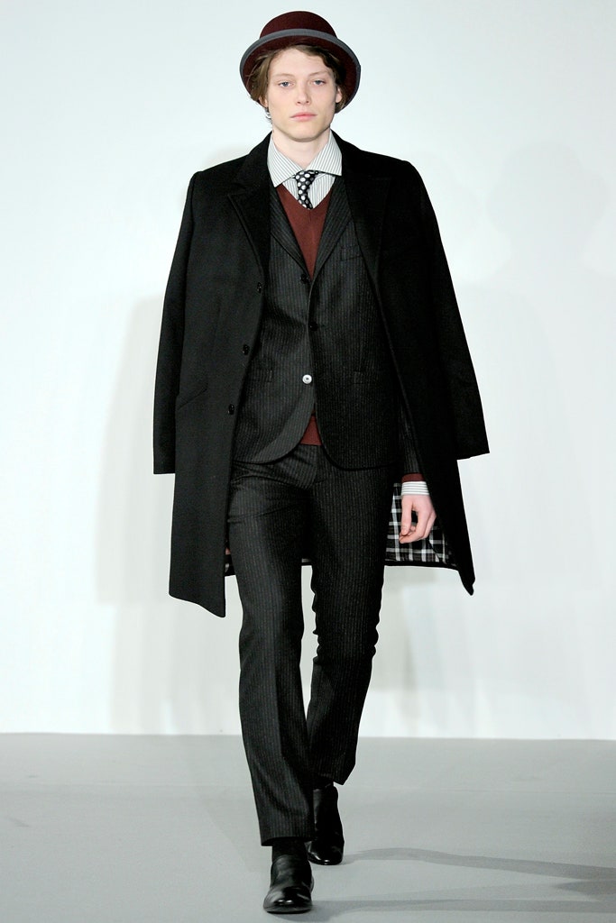black tailored coat with suit