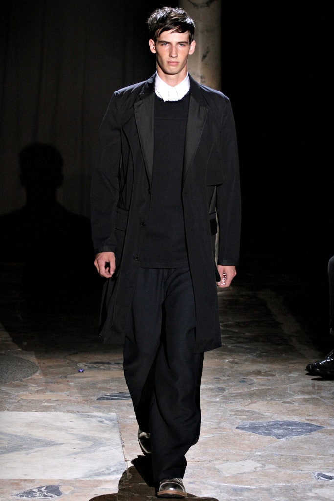 black wool long-sleeve collared structured buttoned coat