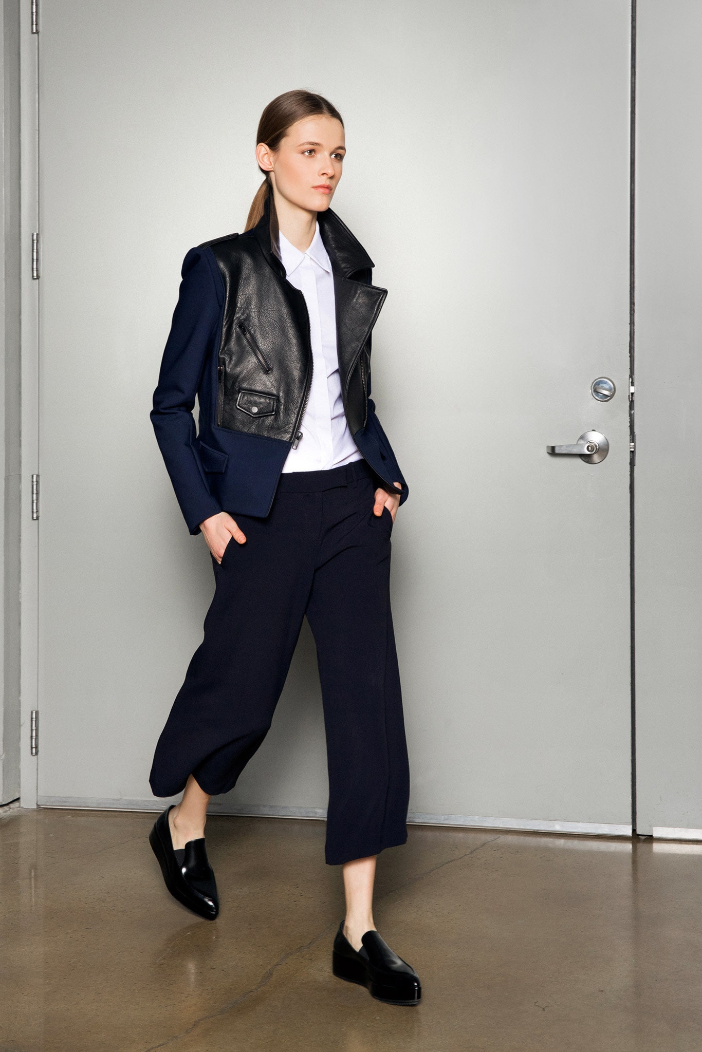 black leather long-sleeve collared tailored zippered buttoned jacket