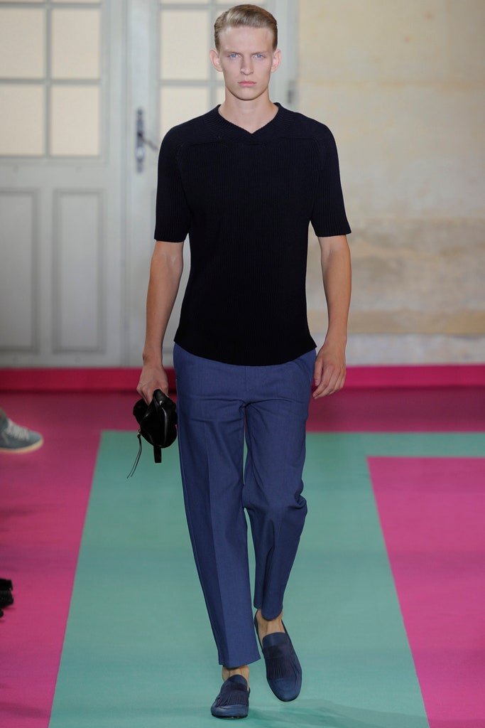 black fitted top with blue tailored pants