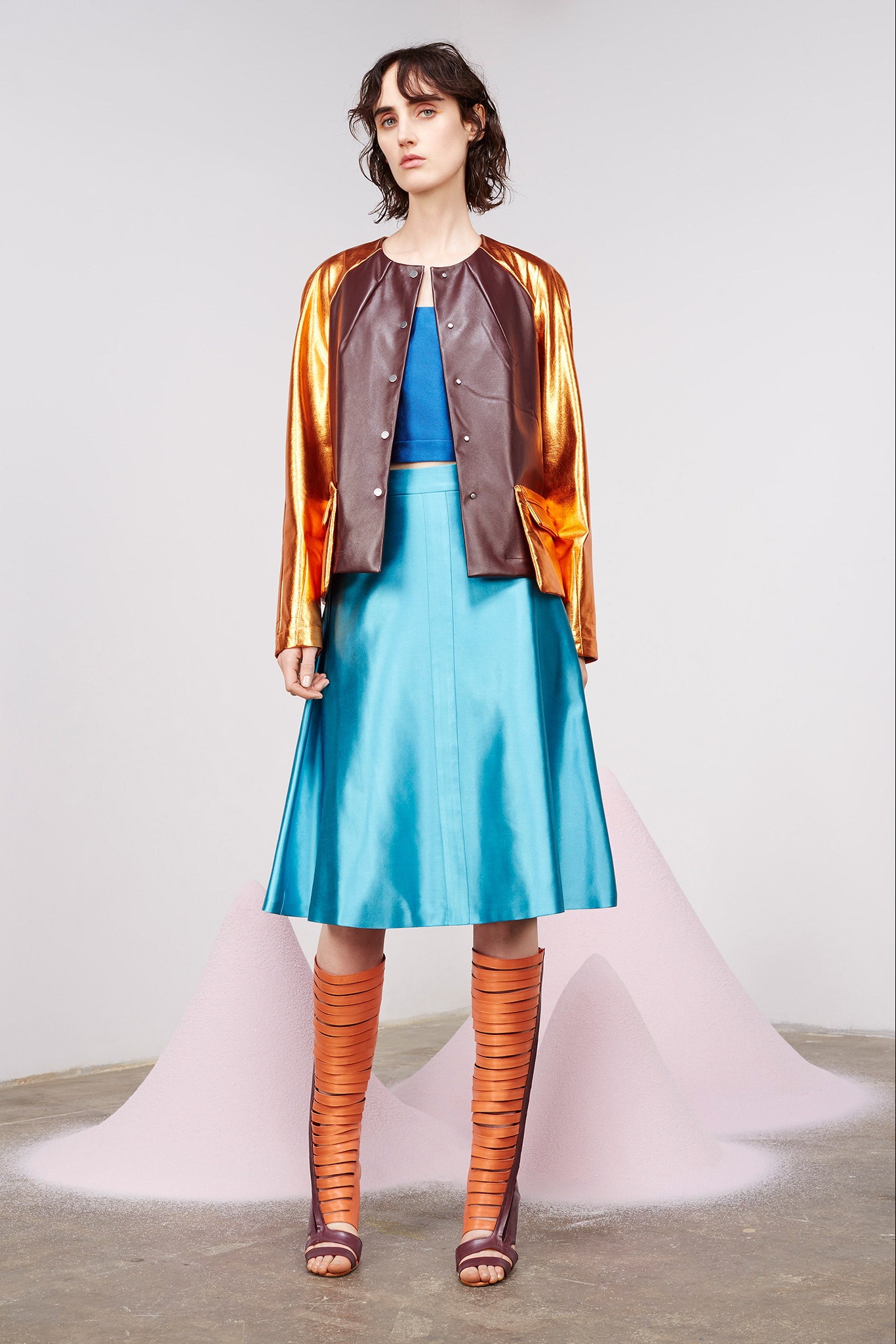 brown leather long-sleeve collared fitted zippered shiny jacket