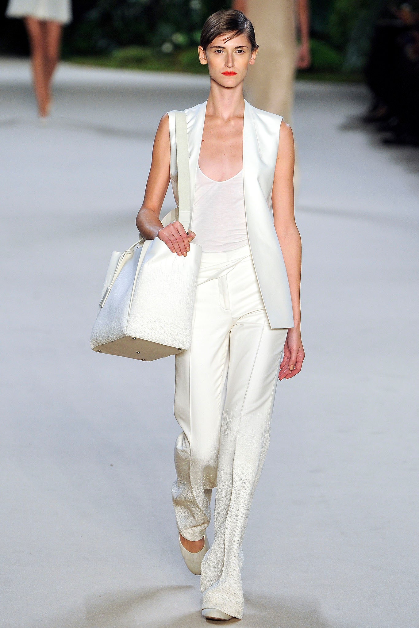 white silk sleeveless v-neck fitted straight-leg suit