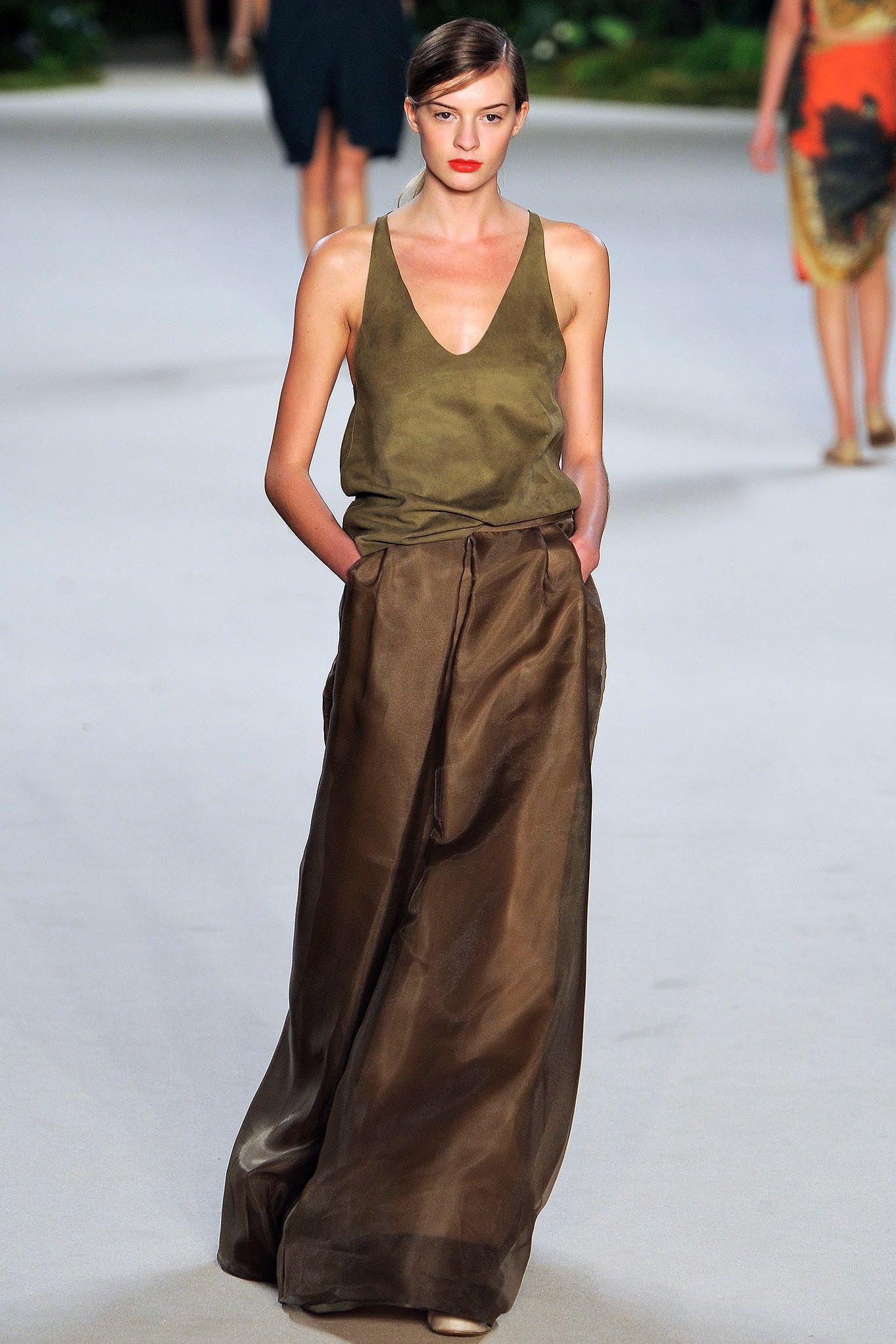 green silk sleeveless v-neck fitted top