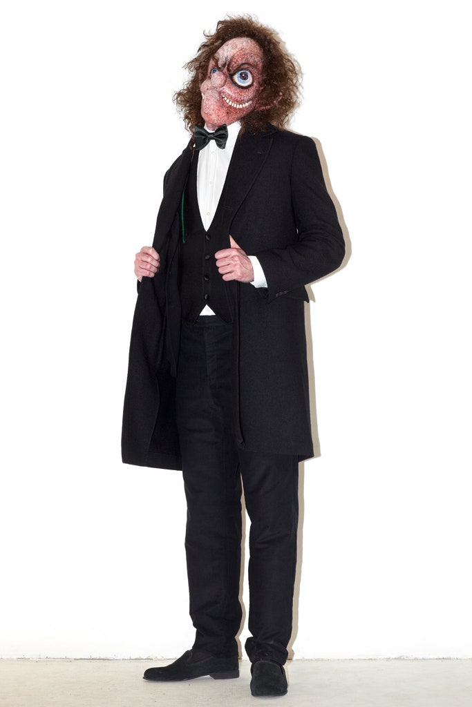 black coat and vest outfit