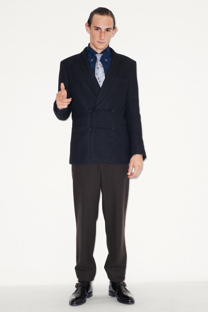 black tailored blazer with brown pants