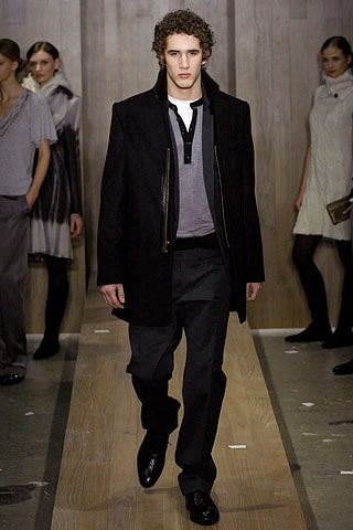 black wool coat gray shirt black pants