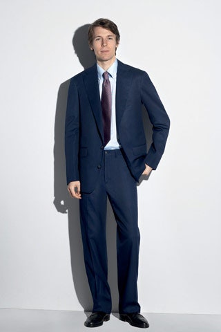 blue tailored suit with light blue shirt