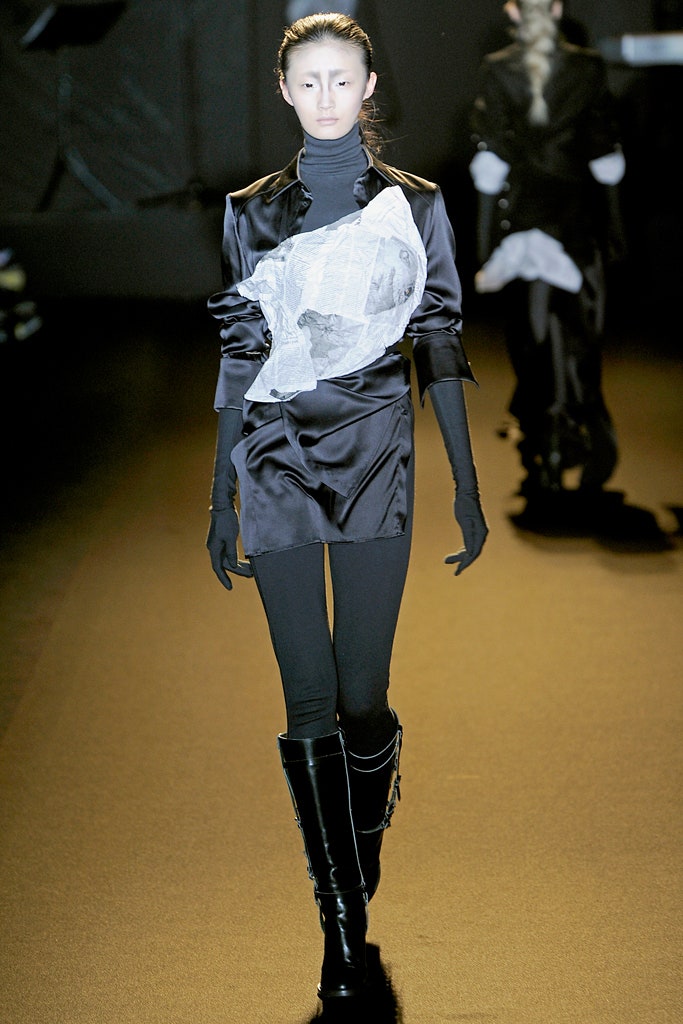 black silk top with asymmetric detail
