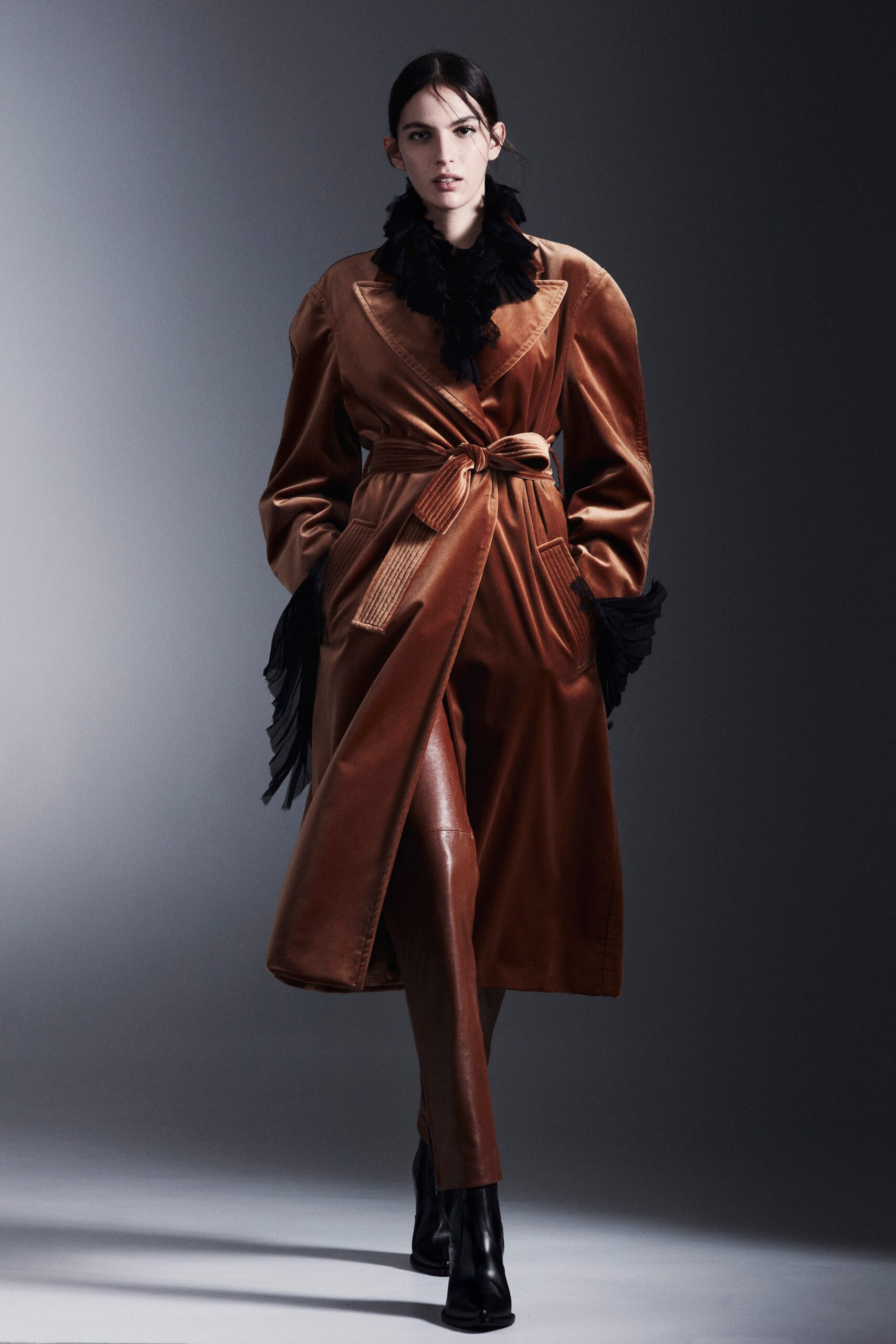 brown silk coat and leather pants