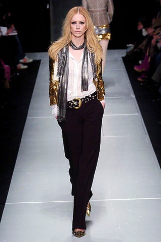 gold sequined blazer with black pants