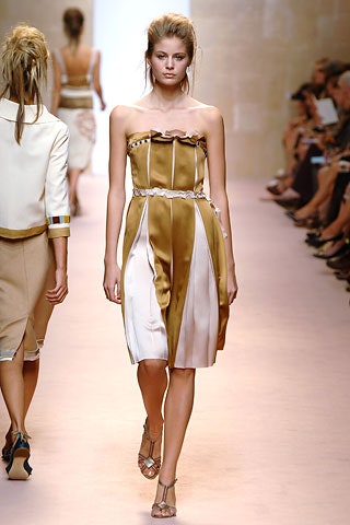 gold and white strapless pleated dress