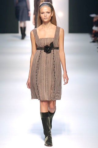 brown pleated mini dress with green boots