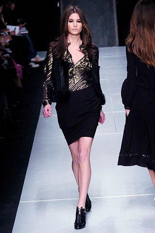 black gold fitted top and mini skirt