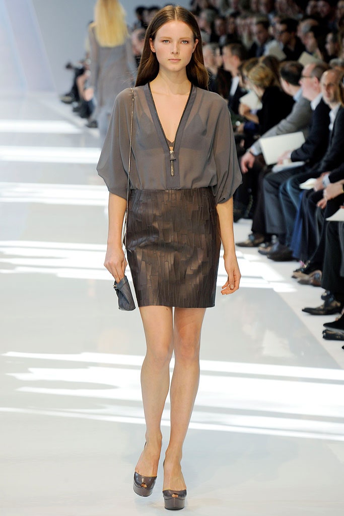 gray silk top with black leather skirt