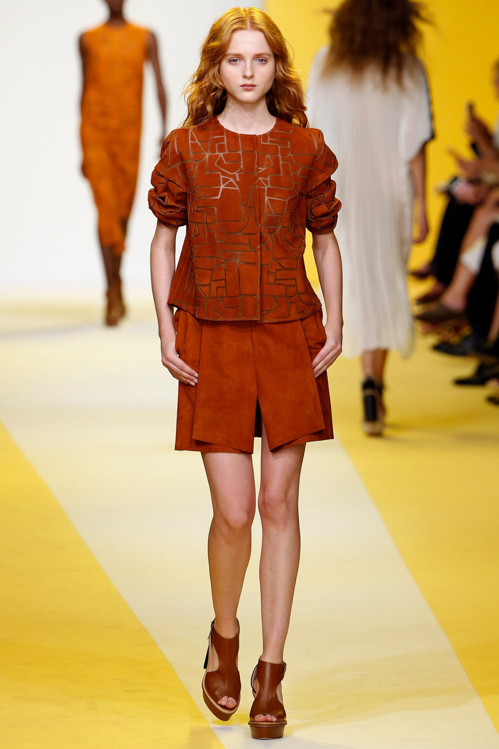 orange suede top and shorts