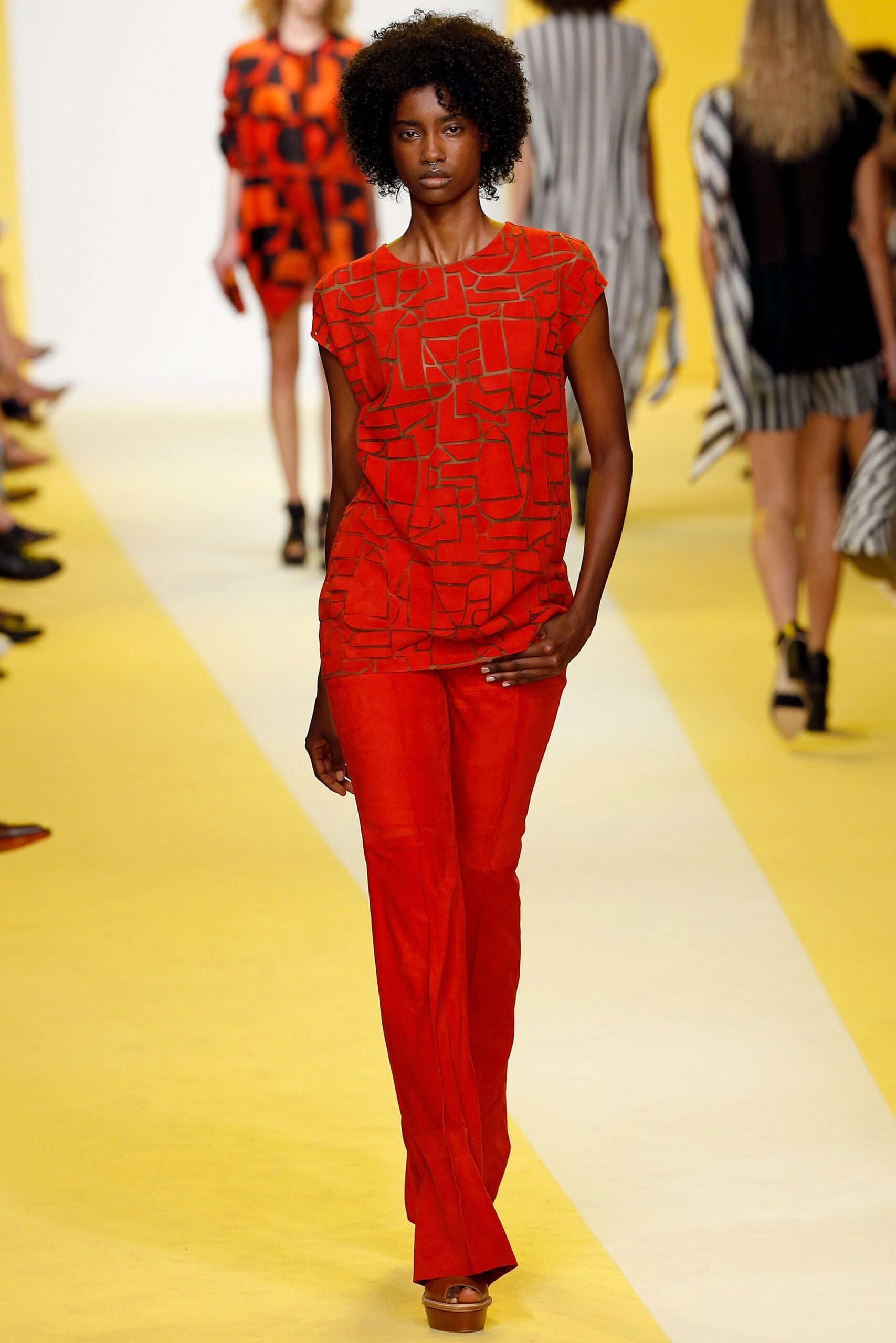red fitted top and pants