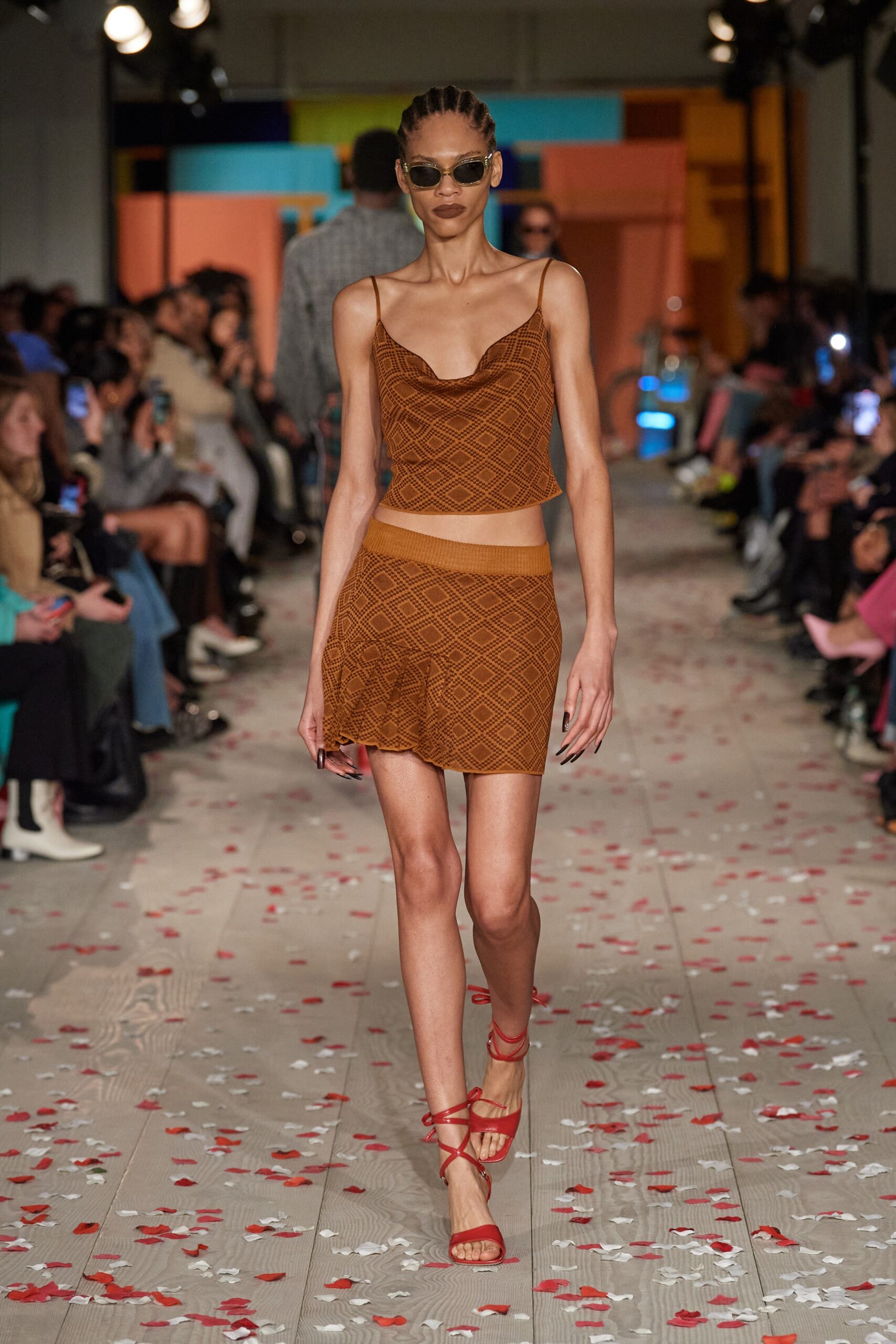 brown embroidered crop-top and mini skirt