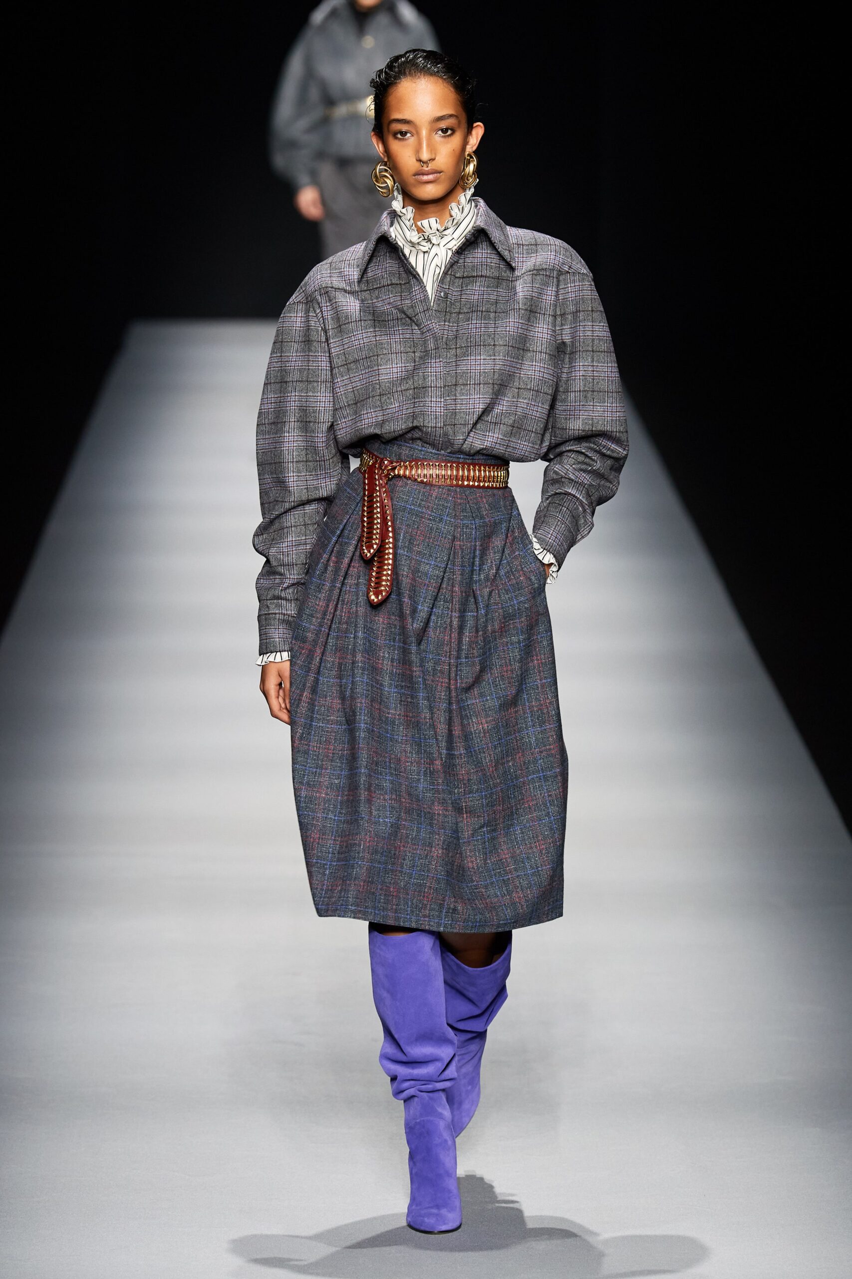gray checked shirt with blue pleated skirt