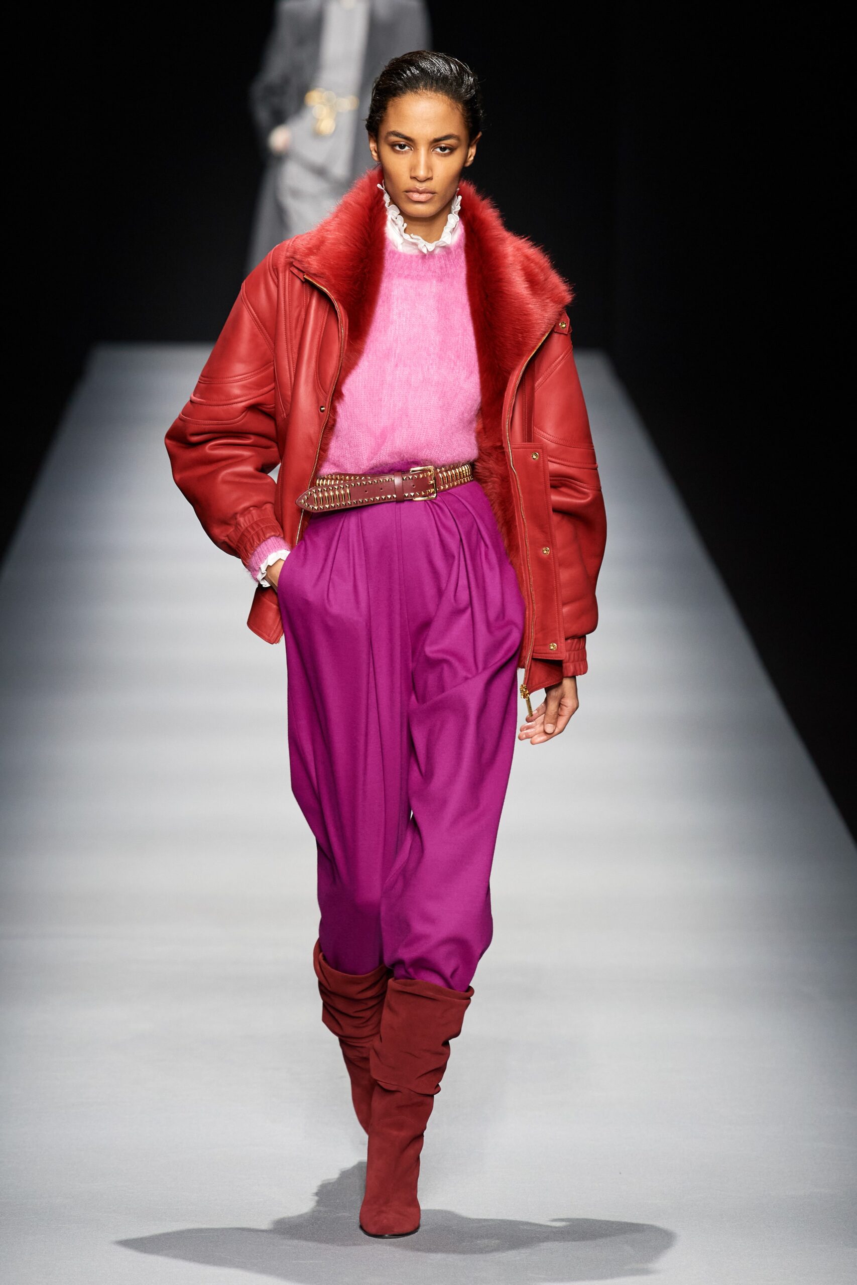 red leather jacket pink sweater