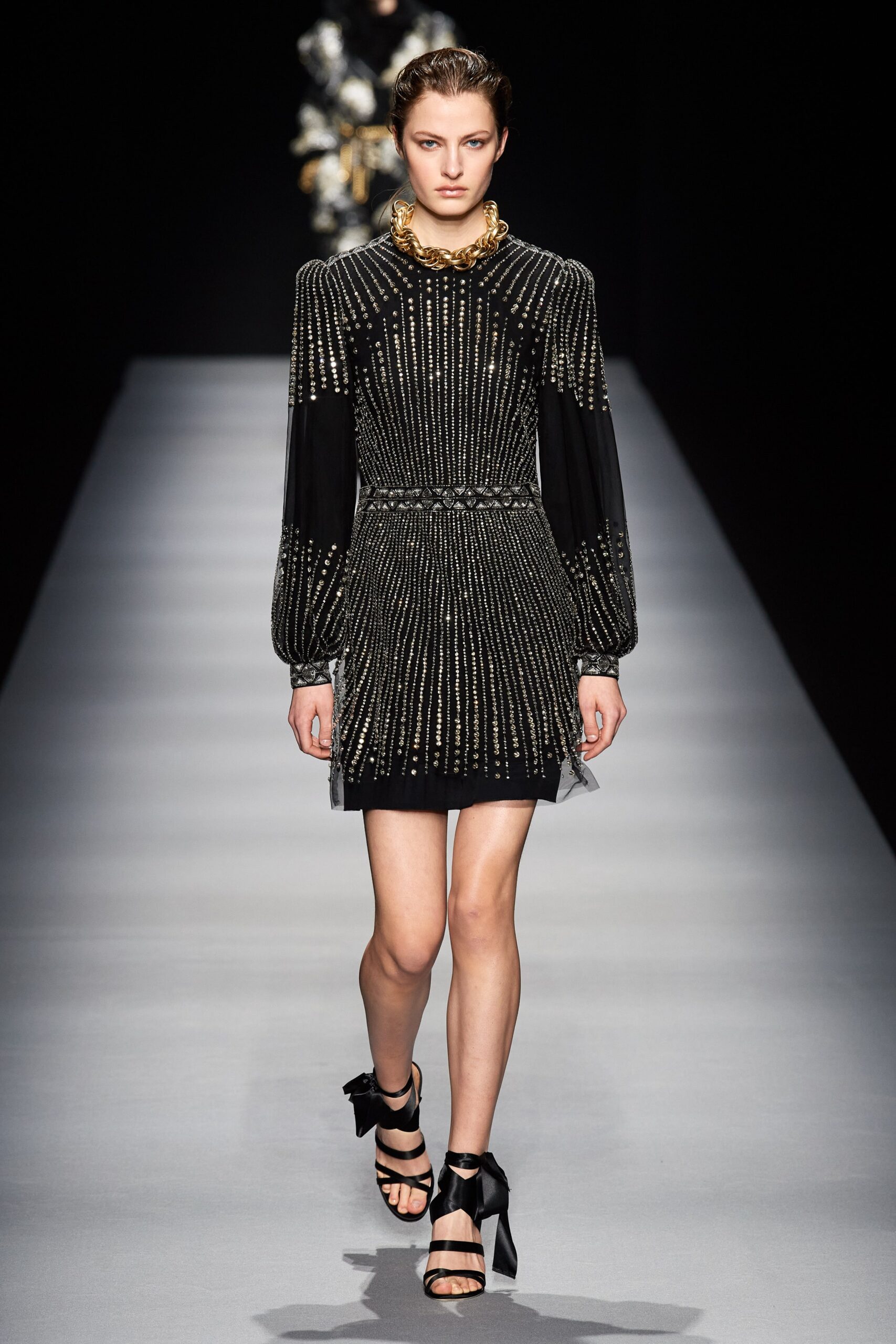 black and gold embellished mini dress