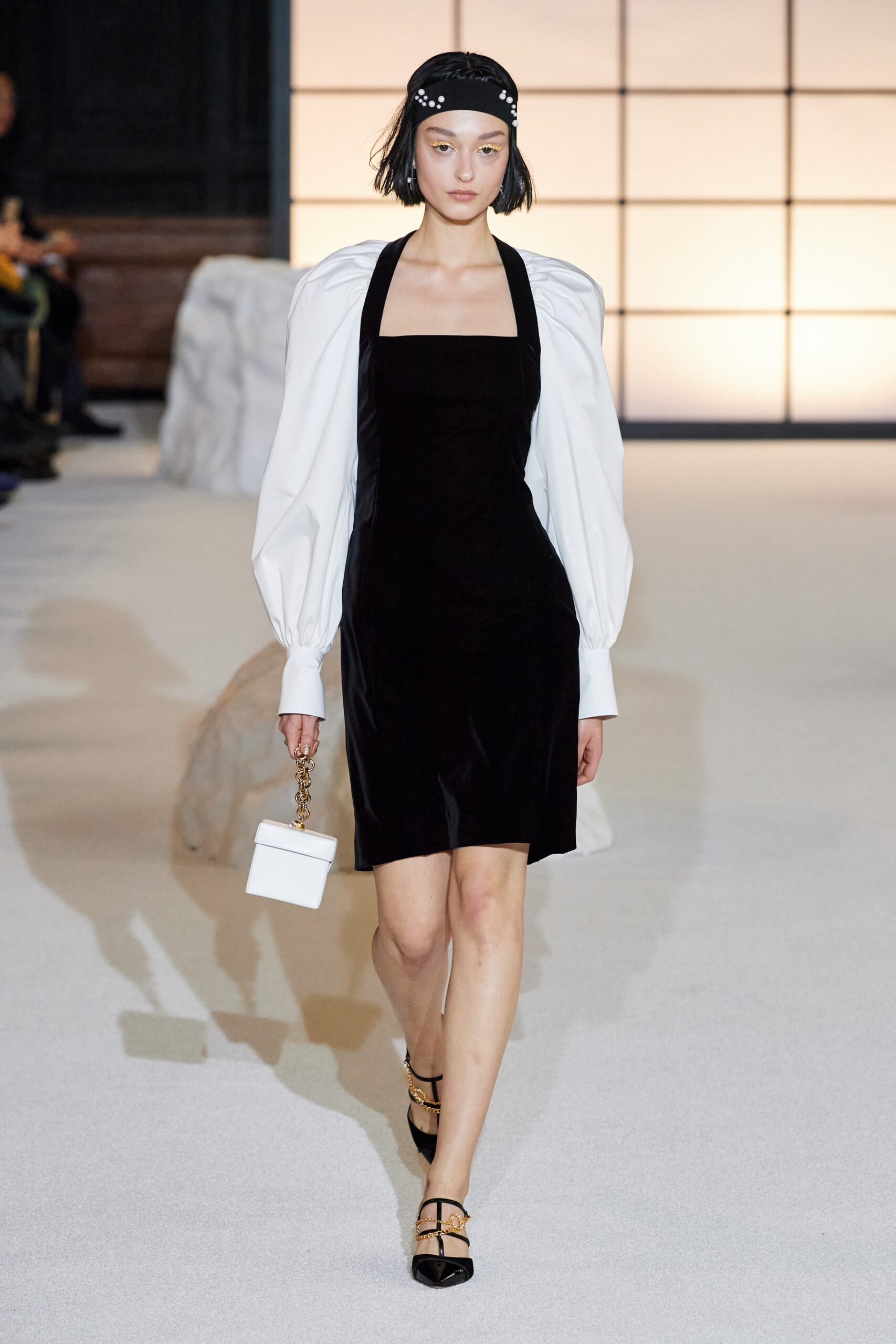 black velvet mini dress with white coat