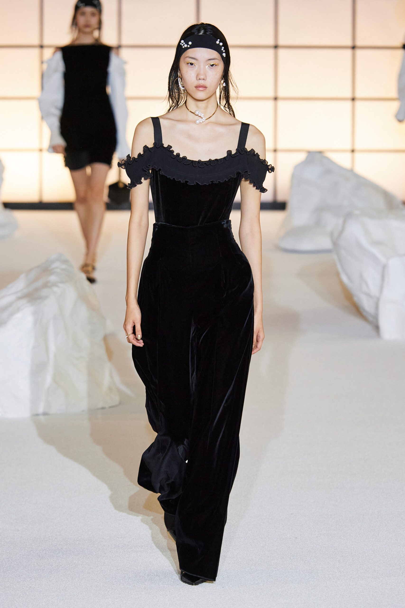 black velvet off-shoulder jumpsuit
