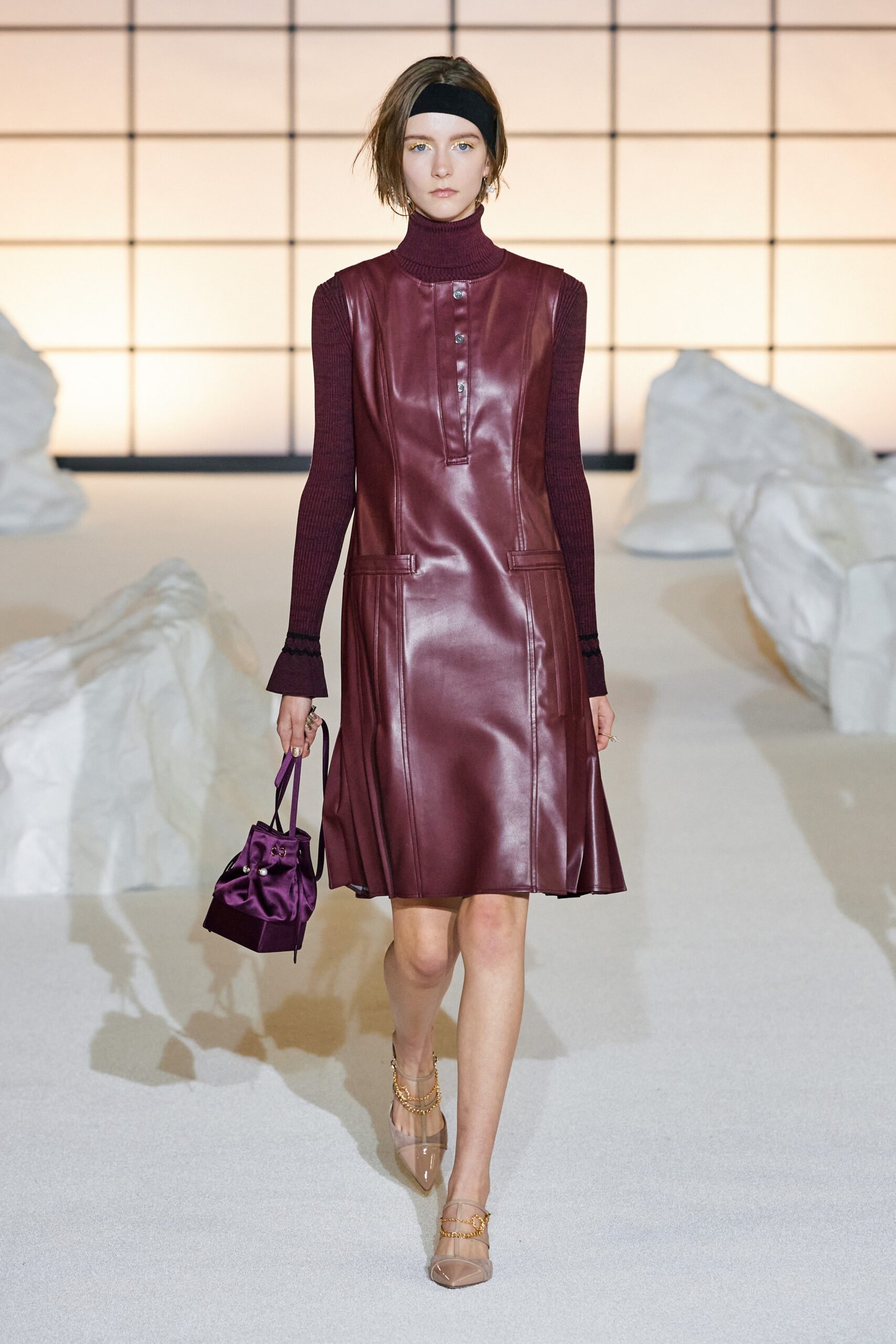 maroon leather sleeveless high-neck fitted a-line buttoned dress