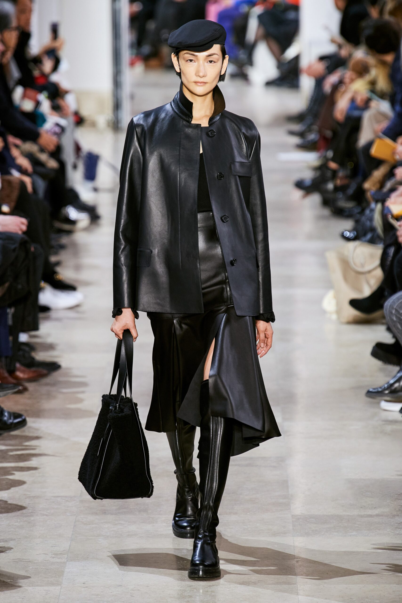 black leather fitted jacket and skirt