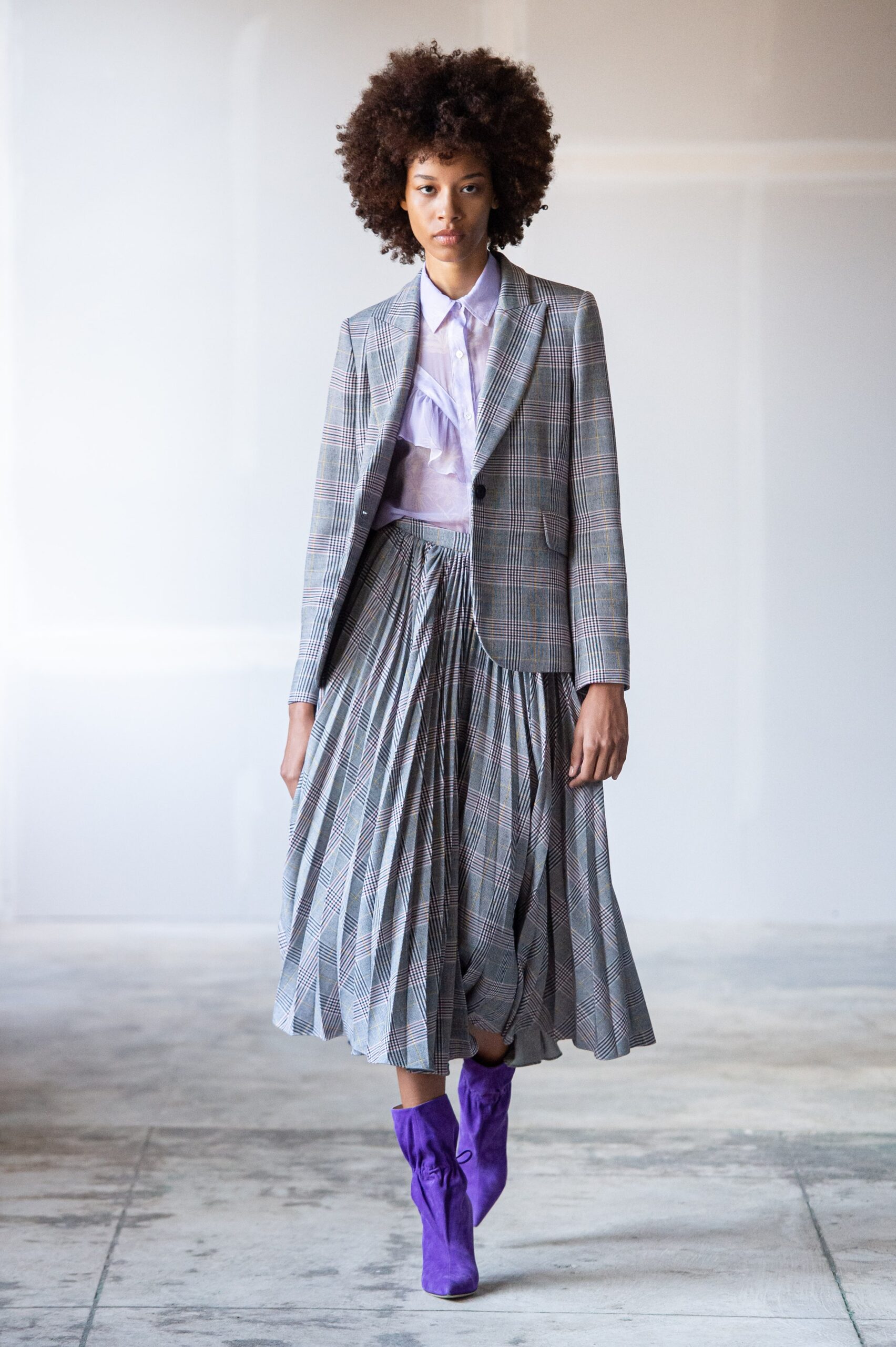 tailored gray blazer with pleated skirt